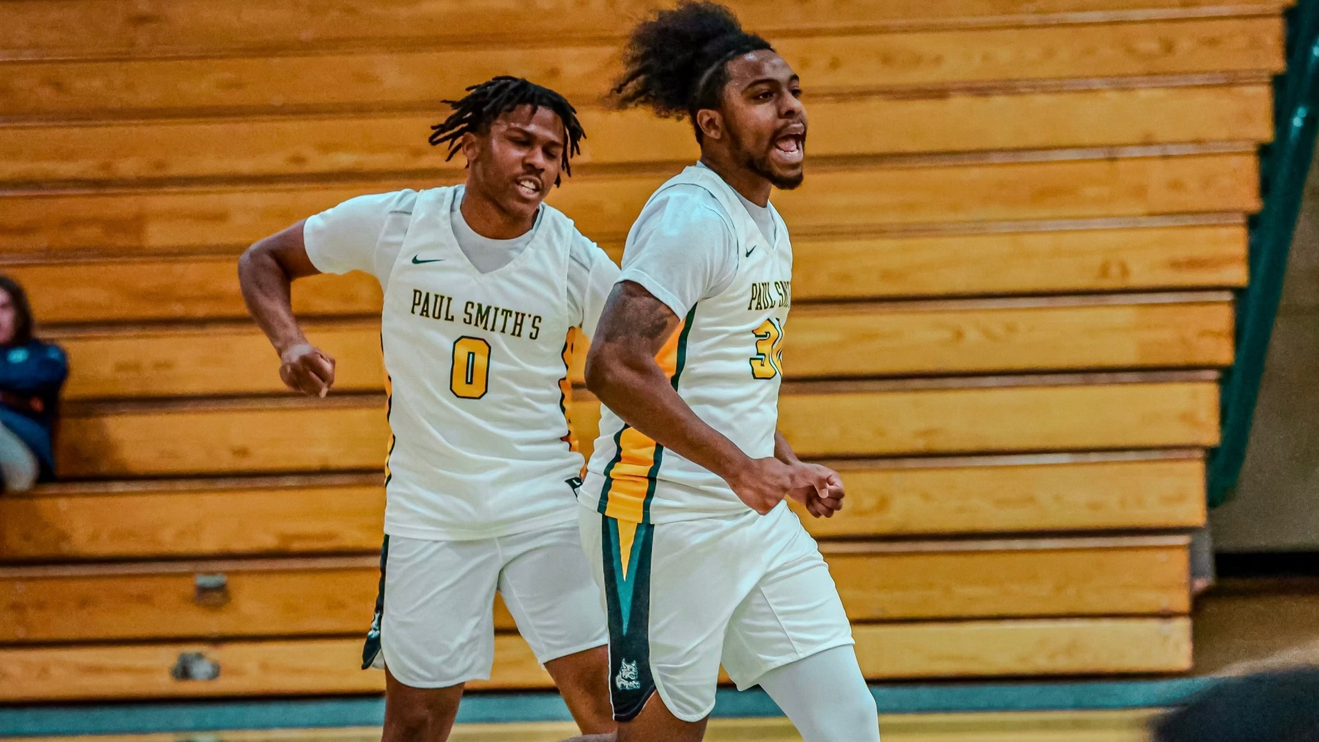 Elijiah Pratt (left) and Brian Foster (right) celebrate during a recent game. (Mercedes Rideout photo) Thumbnail