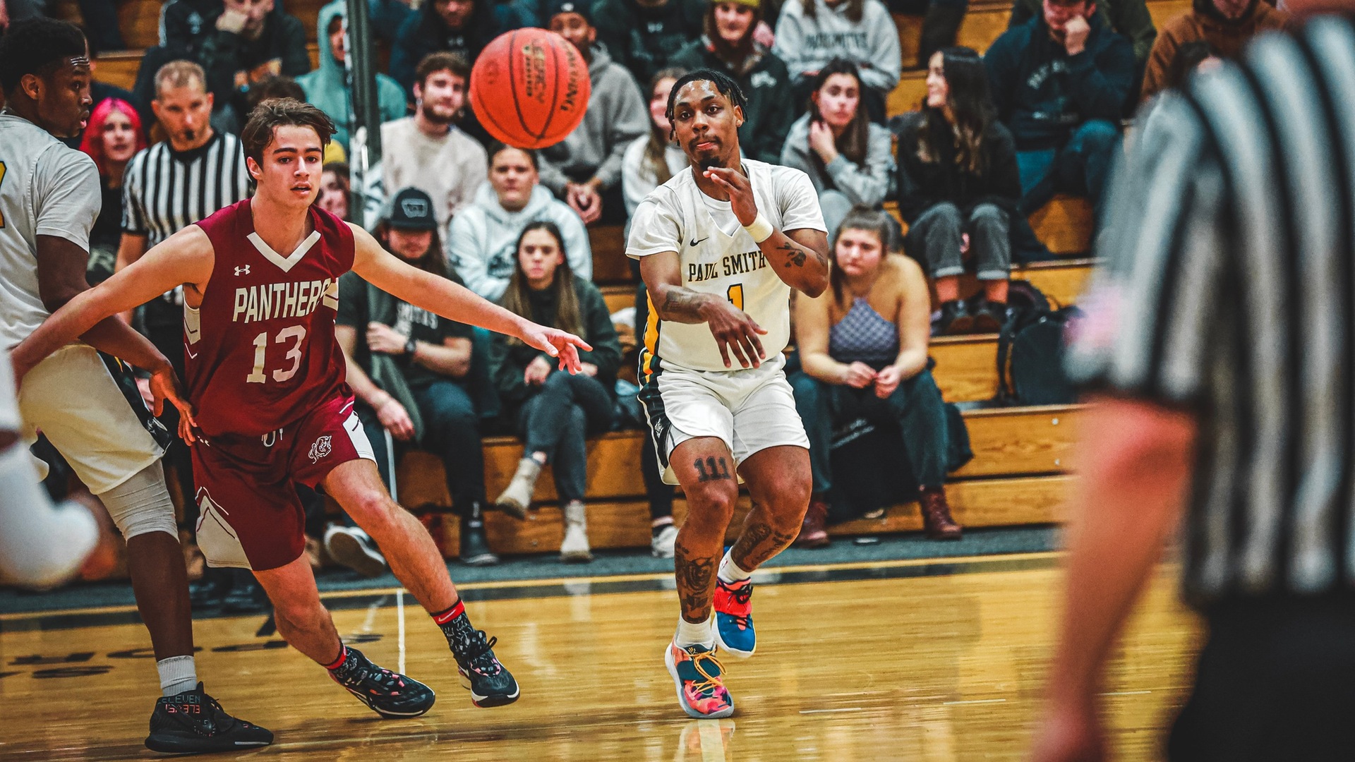 Senior guard Anthony Miller Jr. connects a pass against ACPHS on Friday night in front of a large home crowd (Mercedes Rideout photo). Thumbnail