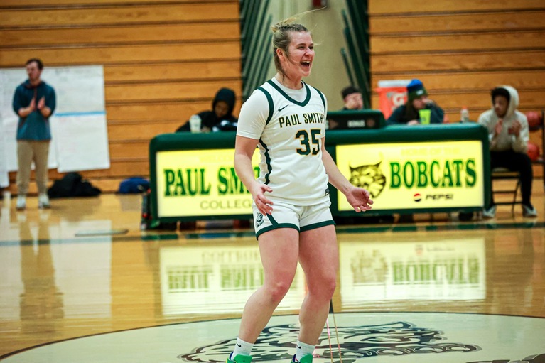 Hayleigh Gates celebrates after the Bobcats hit a three pointer in their game on Sunday vs. NHTI. (Mercedes Rideout photo)