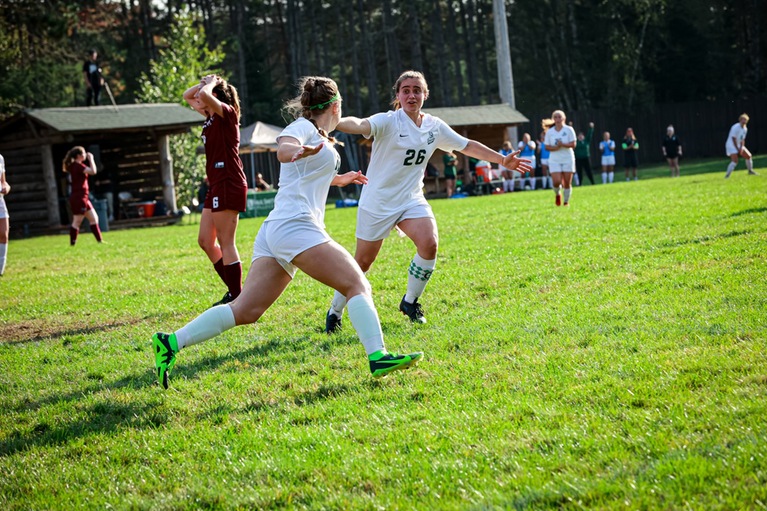 Micaela Diller (left) and Grace Kronick (right) celebrate after a goal in the first half (Mercedes Rideout photo).