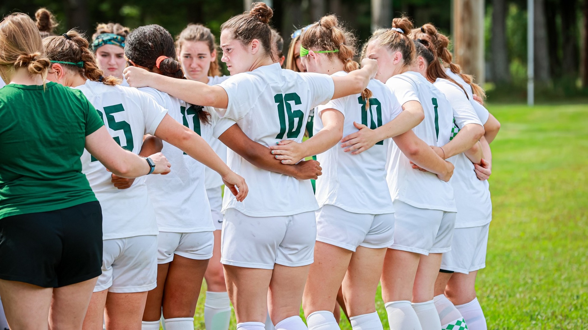 The Paul Smith's College women's soccer team gathers before a recent home game (Mercedes Rideout photo). Thumbnail